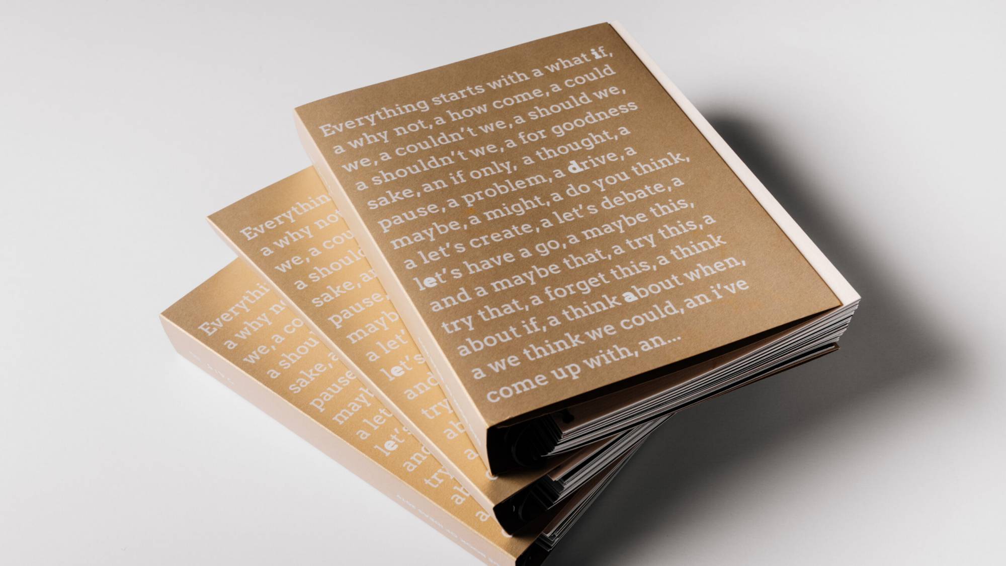 DAIS - Ten Year Project (2010 - 2019) Three books stacked on top of one another