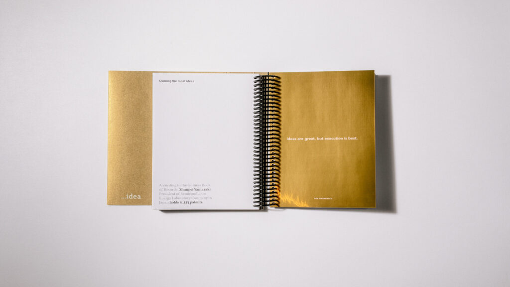 DAIS - Ten Year Project (2010 - 2019) White and gold internal spread of book