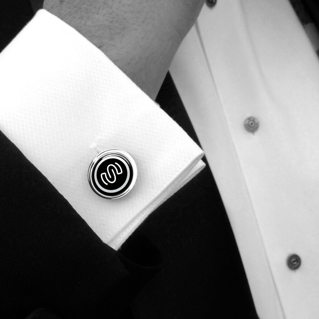 Seneworth - Close up on person wearing branded cufflinks- Stationery package