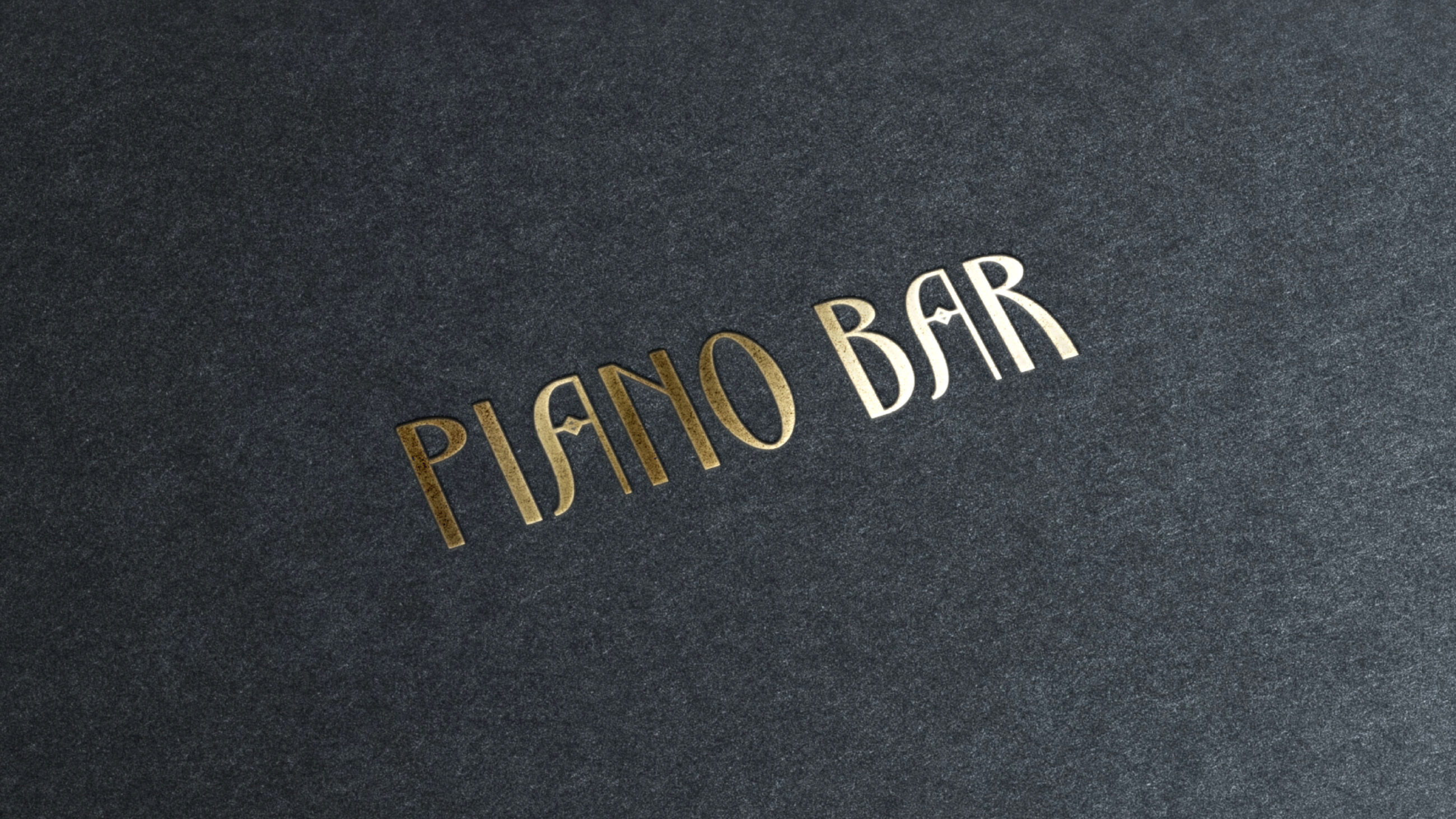 Piano Bar in gold lettering on suede background- brand expansion