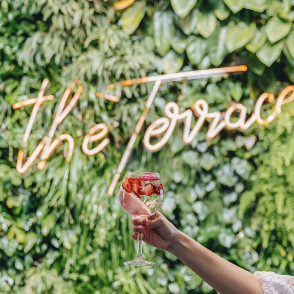 The Terrace-Neon lights on plant wall- new sub brand