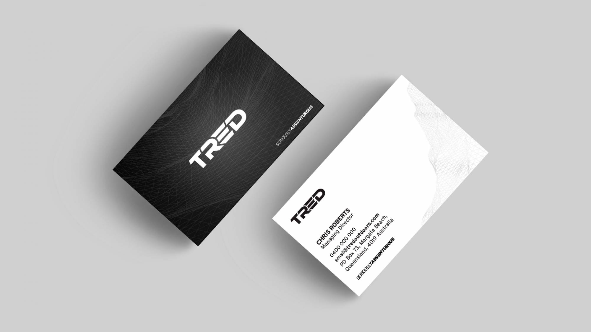 Tred business cards, black and white on grey background