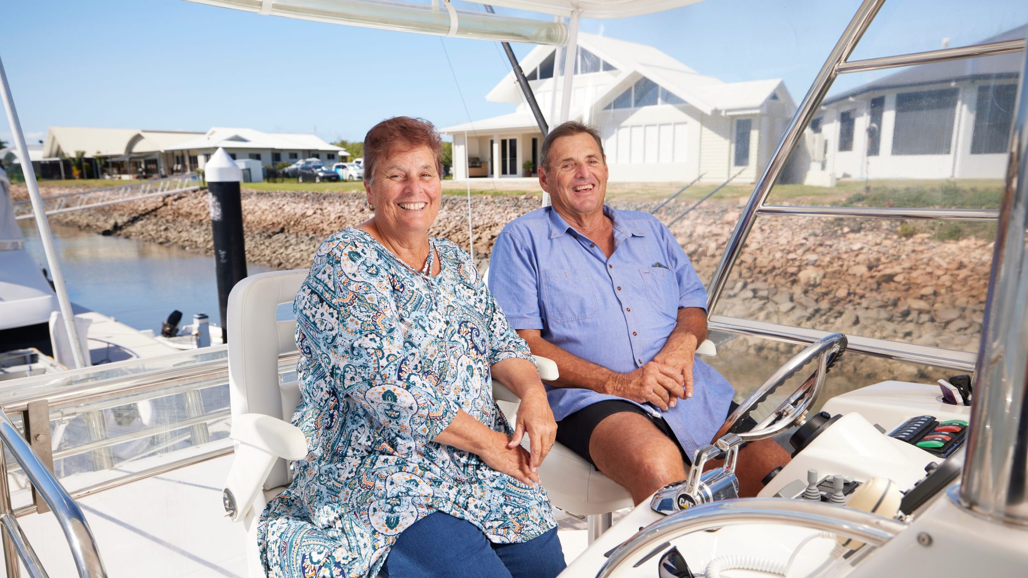 Photography of retired couple on a boat enjoying their financial freedom