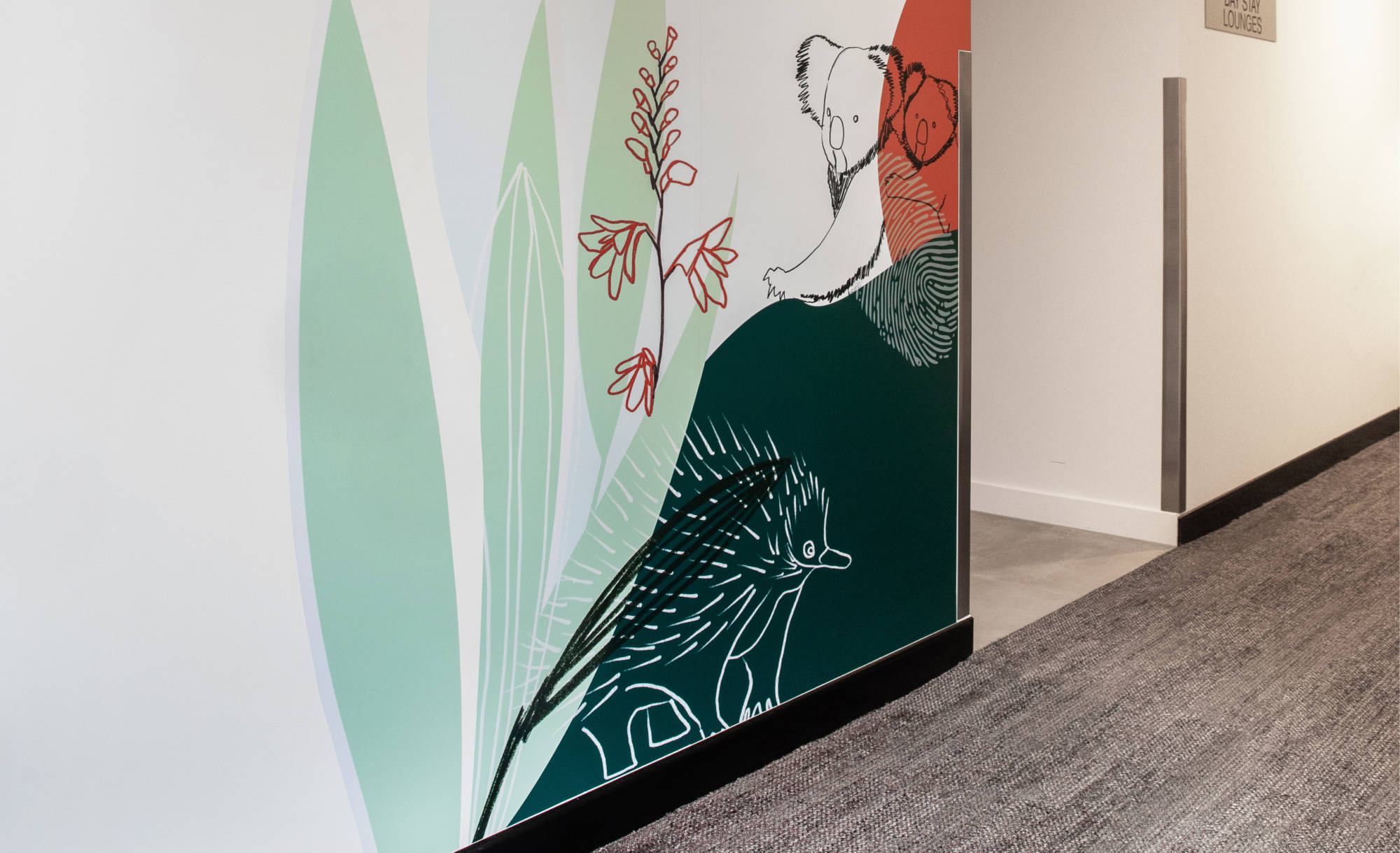 Hallway mural of Australian flora and fauna designed by Brisbane DAIS Brand Strategy Advisors